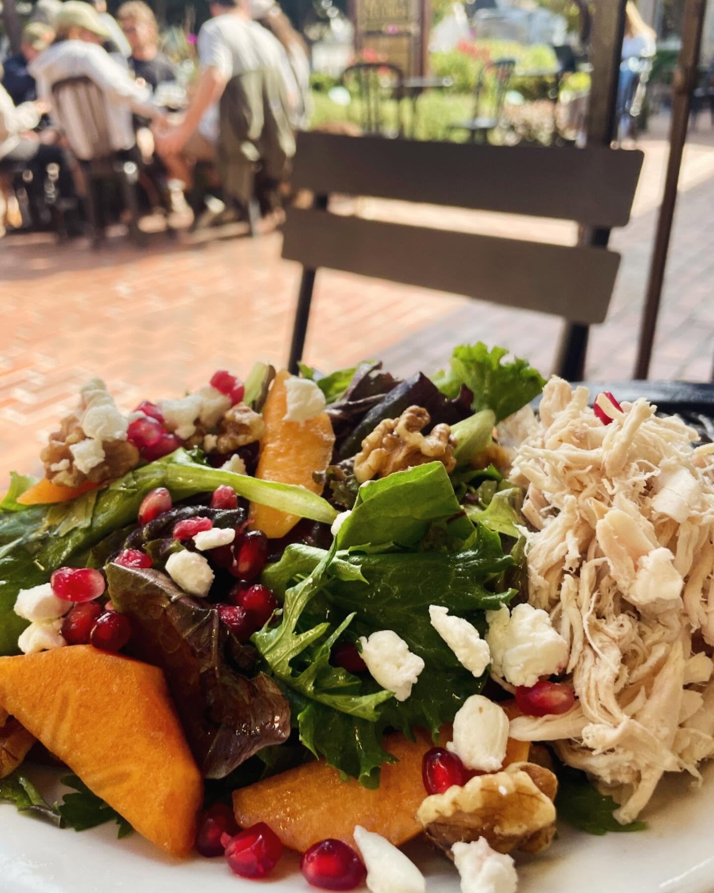 Seasonal harvest salad with persimmon, pomegranate and chicken